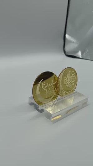 Gold mirrored acrylic discs in Ramadan Kareen and Eid Mubarak